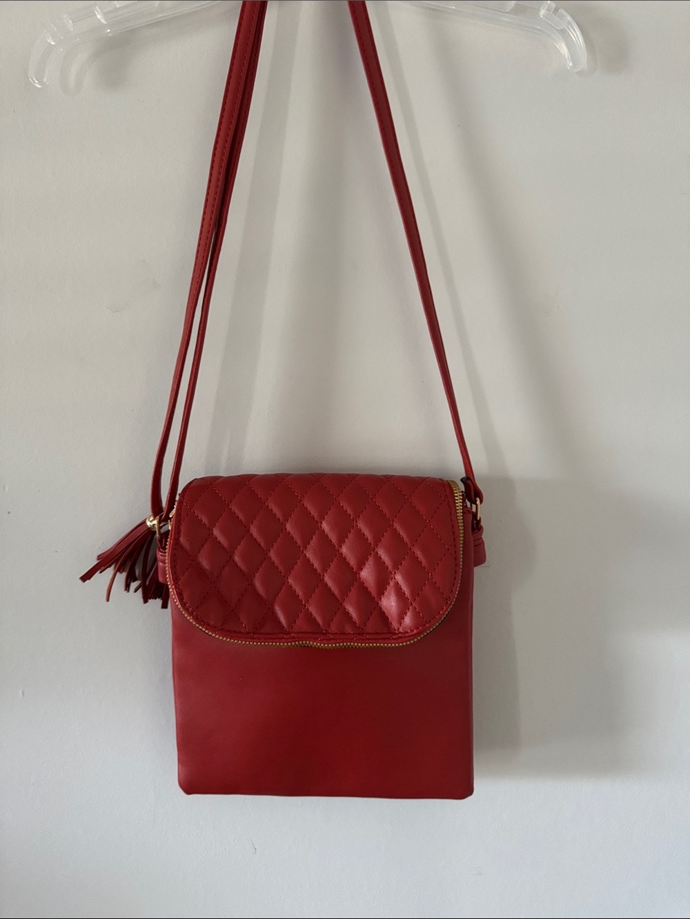 Quilted Red Crossbody Bag with Tassel Accent